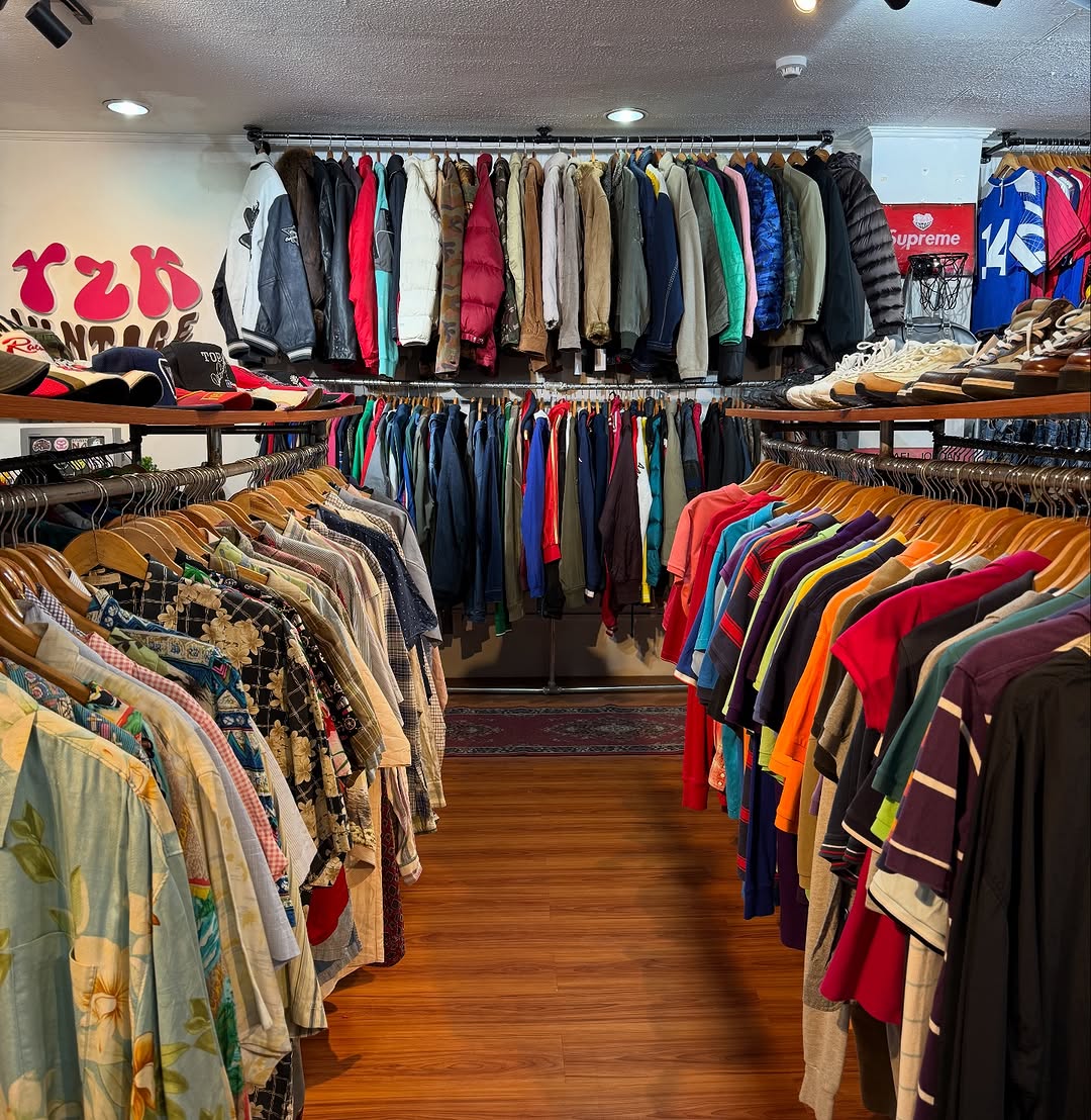 Y2K Vintage store interior — brand wall mural and racks